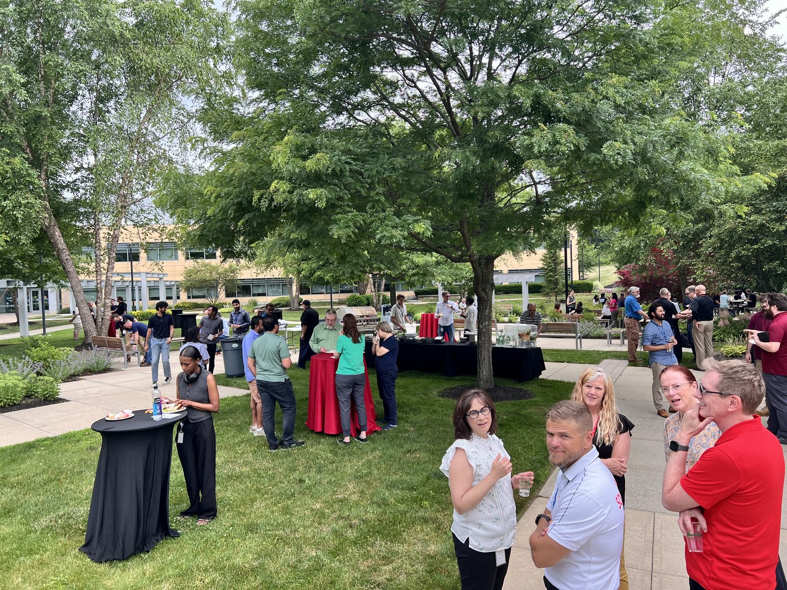 Attendees networking outdoors at a past BostonSWUG Summer Festival